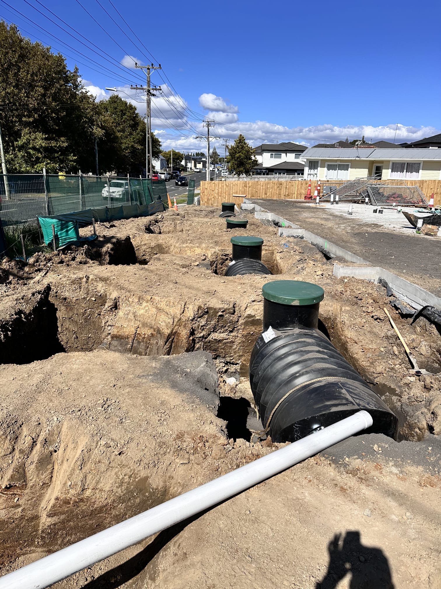 Installed rainwater tank beside residential property
